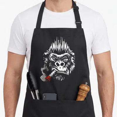 Tablier de cuisine noir avec illustration d'un gorille fumant une cigarette en style gravure blanche et grise.