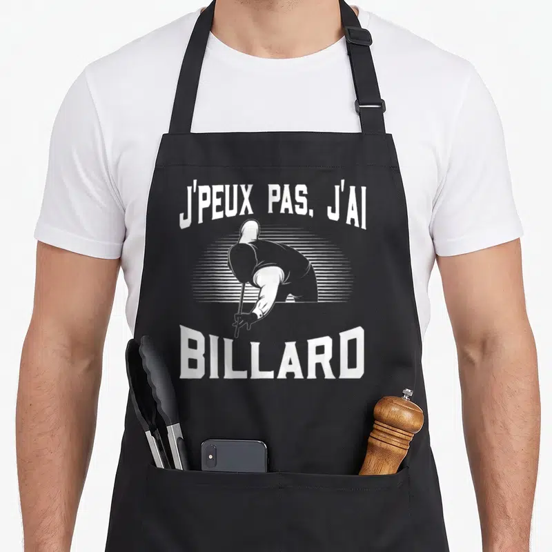 Tablier de cuisine noir avec illustration d'un joueur de billard et le texte j'peux pas j'ai billard en blanc.