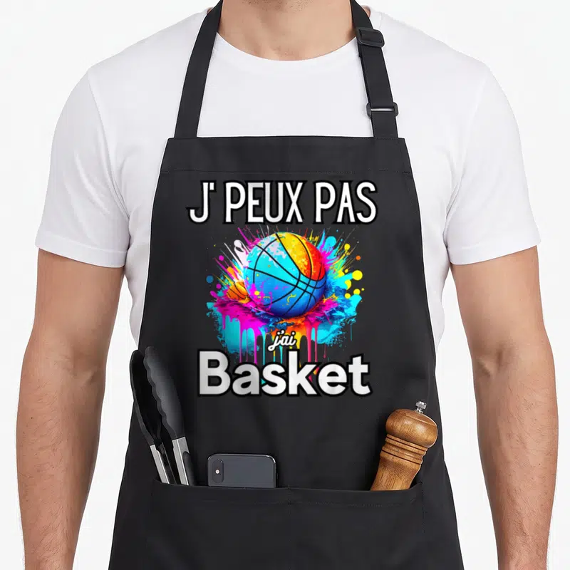 Tablier de cuisine noir avec illustration de ballon de basket aux couleurs vives et texte blanc J PEUX PAS JAI BASKET