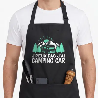 Tablier de cuisine noir avec illustration d'un camping car vert et texte blanc J'peux pas j'ai camping car campeur