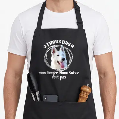 Tablier de cuisine noir avec l'illustration d'un Berger Blanc Suisse et la citation j'peux pas mon Berger Blanc Suisse veut pas.