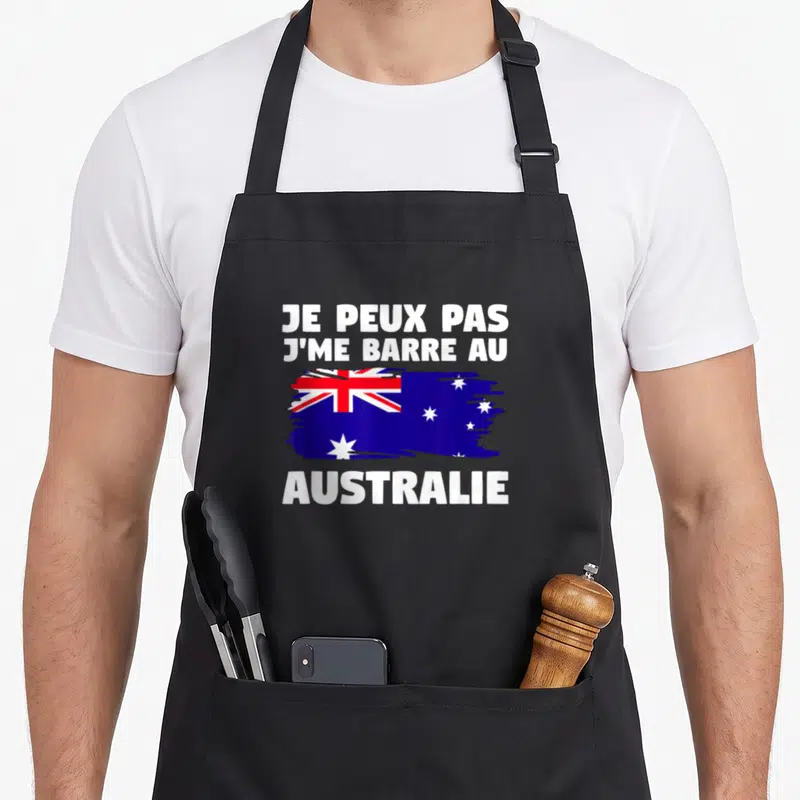 Tablier de cuisine noir avec le texte je peux pas j me barre au Australie et un drapeau australien stylisé.