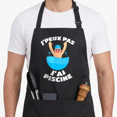 Tablier de cuisine noir avec illustration d'un nageur aux bras levés et texte j'ai piscine