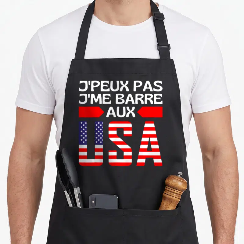 Tablier de cuisine noir avec inscription blanche et lettres USA aux couleurs du drapeau américain.