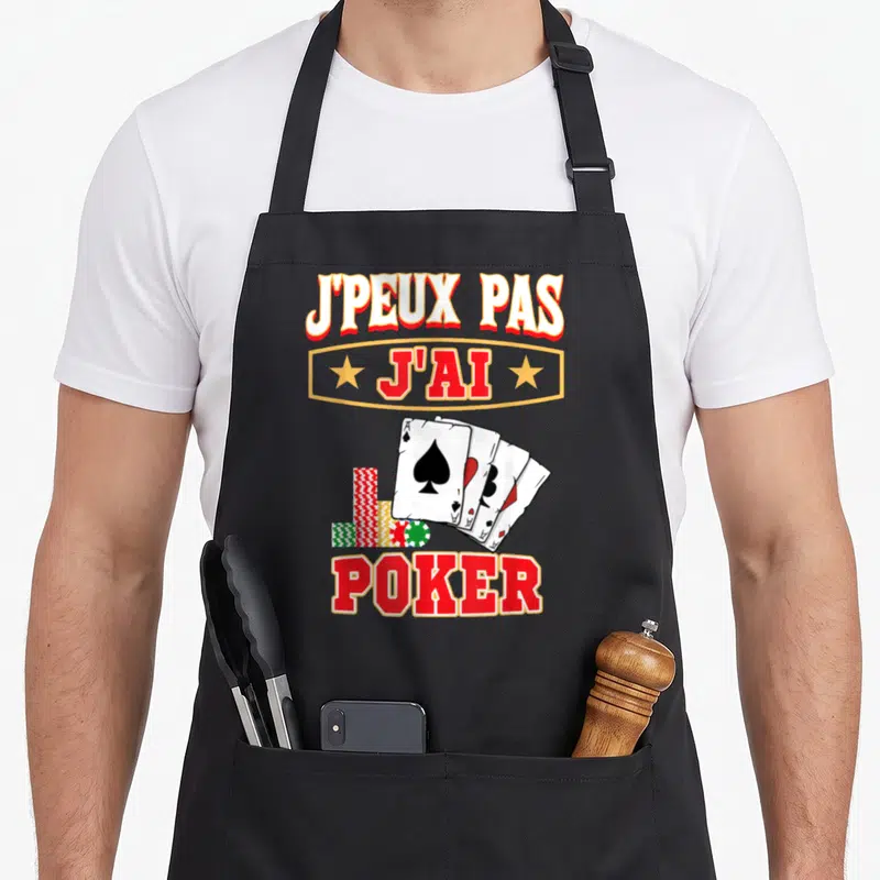 Tablier de cuisine noir avec inscription jpeux pas jai poker et illustration de cartes à jouer et chips colorées.