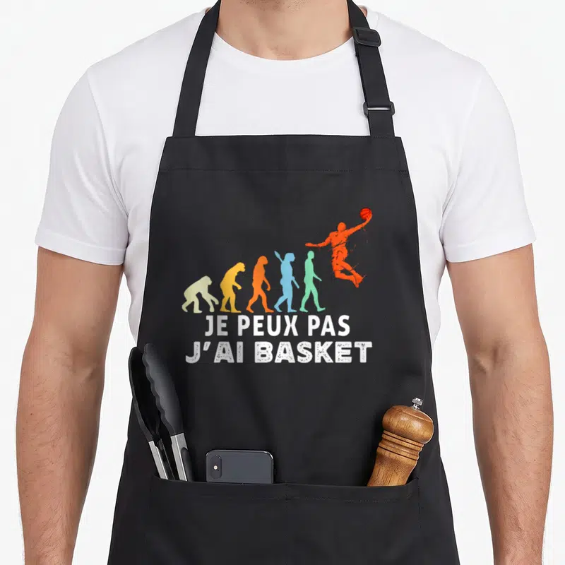 Tablier de cuisine noir avec silhouette évolutive colorée et texte blanc je peux pas j'ai basket