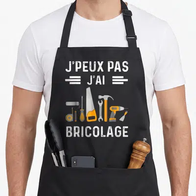 Tablier de cuisine noir avec inscription j'peux pas j'ai bricolage et outils orange gris blanc