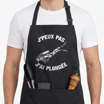 Tablier de cuisine noir avec inscription blanche J'PEUX PAS J'AI PLONGÉE et illustration de plongeur sous-marin.