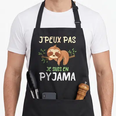 Tablier de cuisine noir avec un fourmi dormant sur une branche et le texte j'peux pas je suis en pyjama.