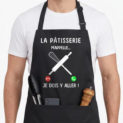 Tablier de cuisine noir avec texte blanc et icônes de téléphone rouge et vert croisés.