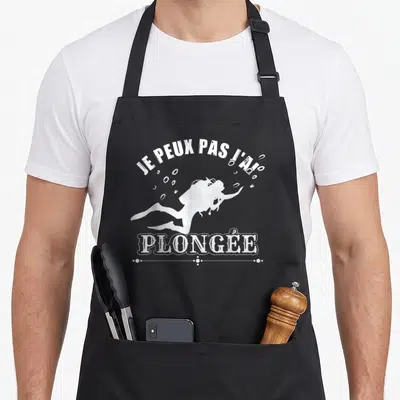 Tablier de cuisine noir avec silhouette blanche d'un plongeur et texte Je peux pas j'ai plongée.