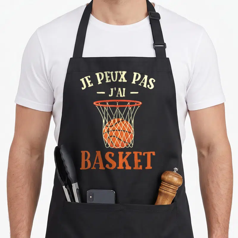 Tablier de cuisine noir avec illustration d'un panier de basket-ball orange et texte blanc Je peux pas j'ai basket.