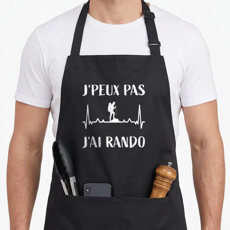 Tablier de cuisine noir avec silhouette randonneur et inscription j'ai rando en blanc.
