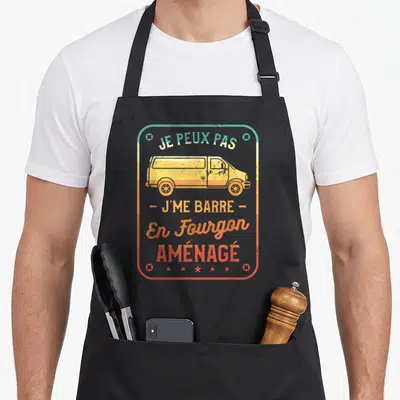 Tablier de cuisine noir avec illustration de fourgon jaune et texte Je peux pas j me barre en fourgon aménagé.
