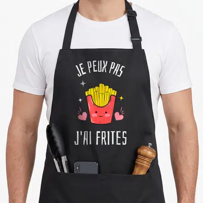Tablier de cuisine noir avec illustration de frites roses et texte blanc Je peux pas j'ai frites.