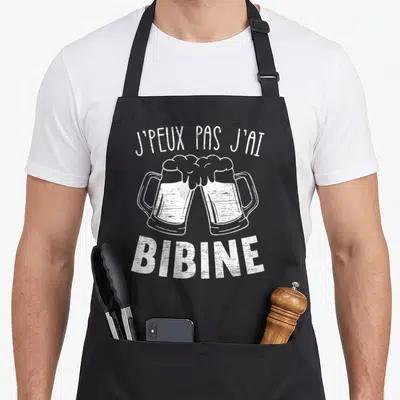 Tablier de cuisine noir avec deux verres de bière et le texte j'ai bibine imprimé en blanc.