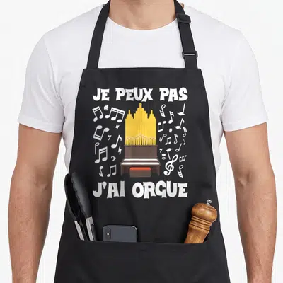 Tablier de cuisine noir avec illustration d'un orgue jaune et texte blanc je peux pas j'ai orgue