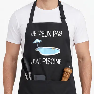 Tablier de cuisine noir avec texte je peux pas j'ai piscine et illustration de petite piscine bleue sous parasol