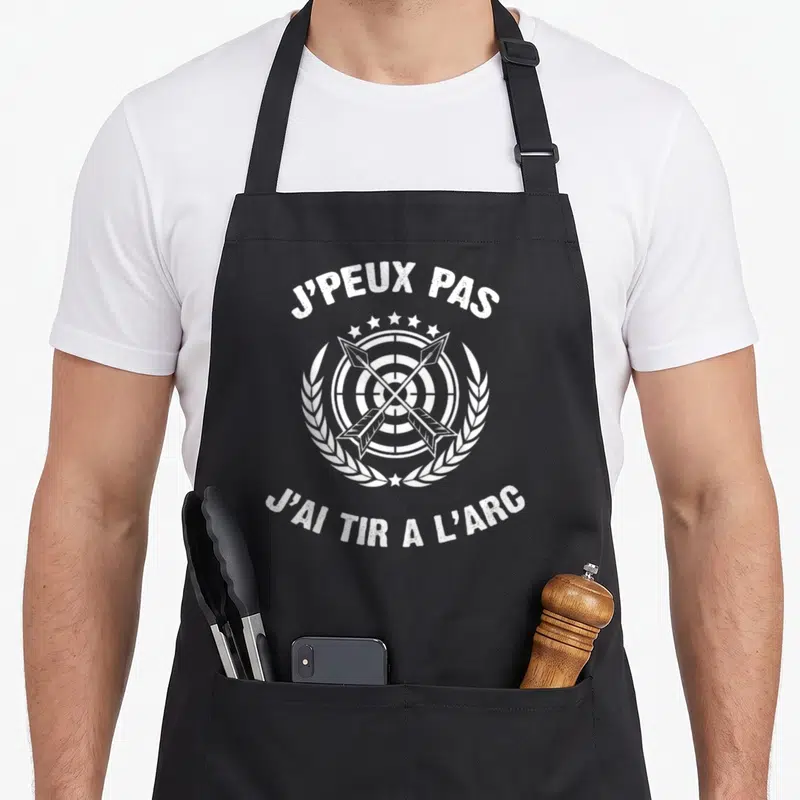 Tablier de cuisine noir avec logo blanc cible flèches et texte j'peux pas j'ai tir à l'arc
