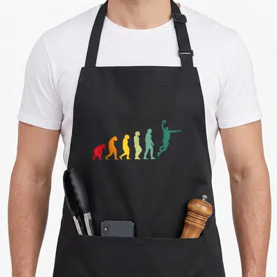 Tablier de cuisine noir avec silhouette évolutive colorée se transformant en joueur de basketball vert