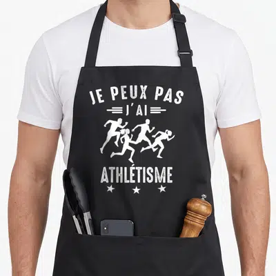 Tablier de cuisine noir avec inscription je peux pas j'ai athlétisme et silhouettes de coureurs en course