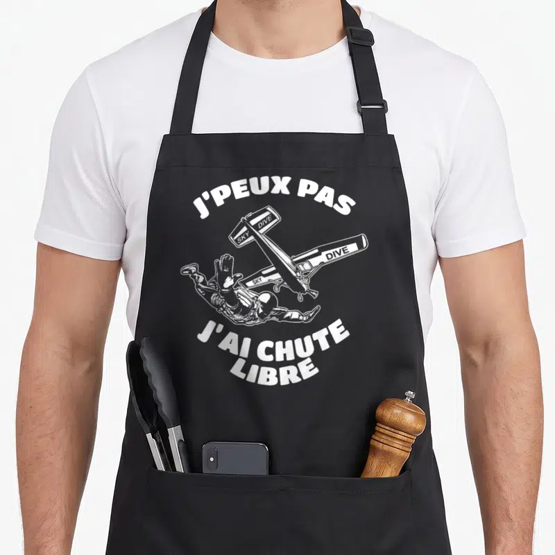 Tablier de cuisine noir avec illustration blanche d'un parachutiste et d'un avion Sky Dive sur le devant.