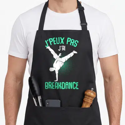 Tablier de cuisine noir avec illustration d'un danseur en breakdance et texte vert menta J'PEUX PAS J'AI BREAKDANCE