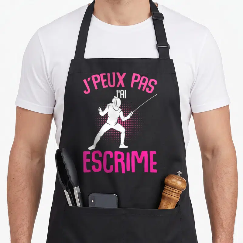 Tablier de cuisine noir avec silhouette d'escrimeur et texte rose vif J'peux pas j'ai escrime