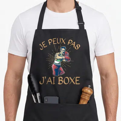 Tablier de cuisine noir avec illustration vintage d'un boxeur et le texte je peux pas j'ai boxe.