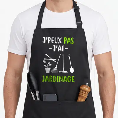 Tablier de cuisine noir avec inscription J'peux pas j'ai jardinage et outils blancs