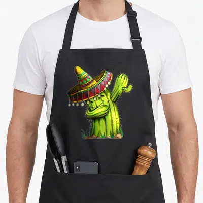Tablier de cuisine noir avec illustration d'un cactus vert coiffé d'un sombrero mexicain multicolore.