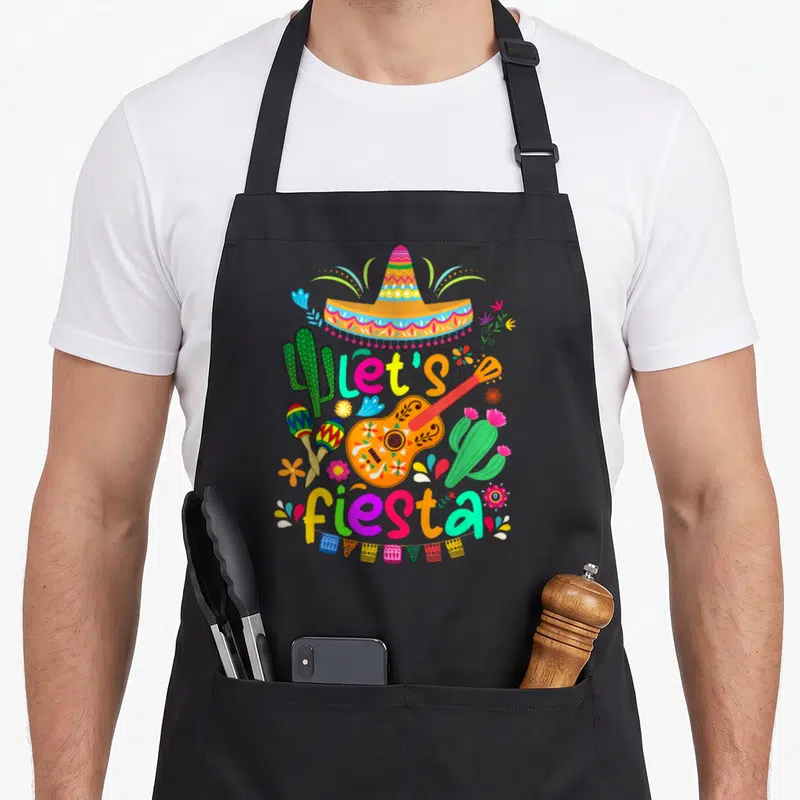 Tablier de cuisine noir avec illustration colorée de cactus, sombrero et Let's Fiesta Party mexicain.