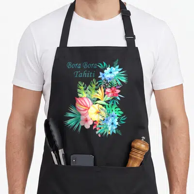 Tablier de cuisine noir avec bouquet de fleurs exotiques et l'inscription Bora Bora Tahiti en bleu.