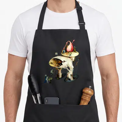 Tablier de cuisine noir avec une illustration surréaliste représentant un paysage fantastique aux couleurs douces et aux formes organiques complexes.