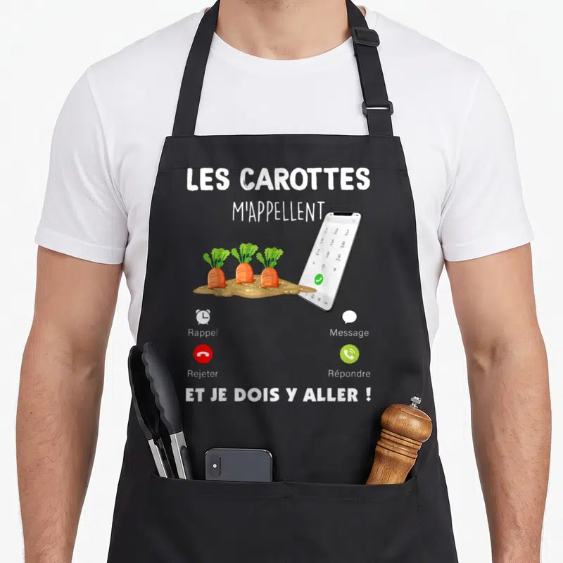 Tablier de cuisine noir avec illustration de trois carottes sortant de la terre devant un smartphone affichant une interface d'appel.