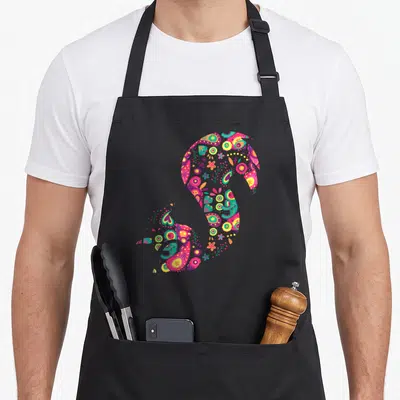 Tablier de cuisine noir avec un écureuil stylisé rempli de motifs floraux colorés et d'éléments hippies vintage.