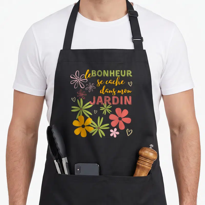 Tablier de cuisine noir avec inscription le Bonheur se cache dans mon JARDIN et fleurs colorées.