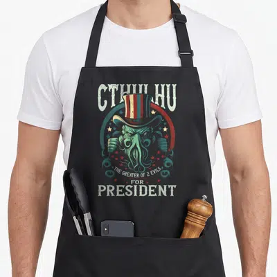 Tablier de cuisine noir avec un monstre aux tentacules portant un chapeau haut de forme américain entouré d'étoiles.