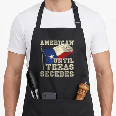 Tablier de cuisine noir avec drapeau du Texas et texte American Until Texas Secedes Texas en typographie rétro beige.