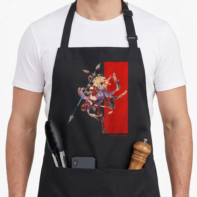 Tablier de cuisine noir avec illustration d'une guerrière blonde tenant une lance bleue sur fond rouge et gris.