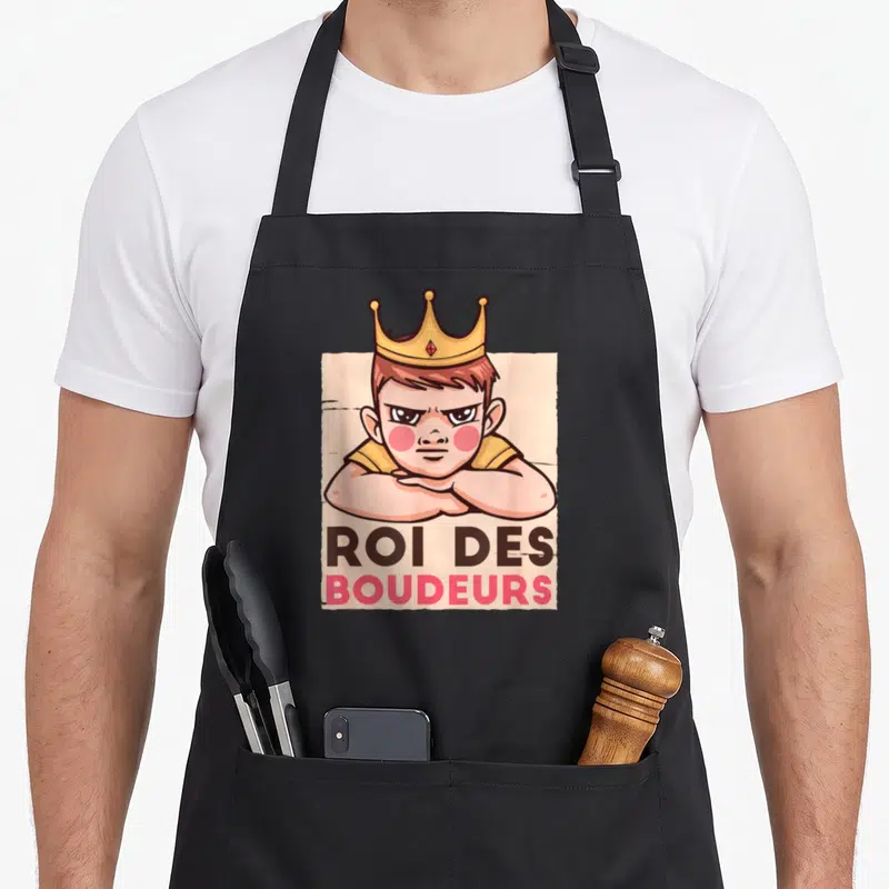 Tablier de cuisine noir avec illustration d'un garçon couronné Roi des boudeurs