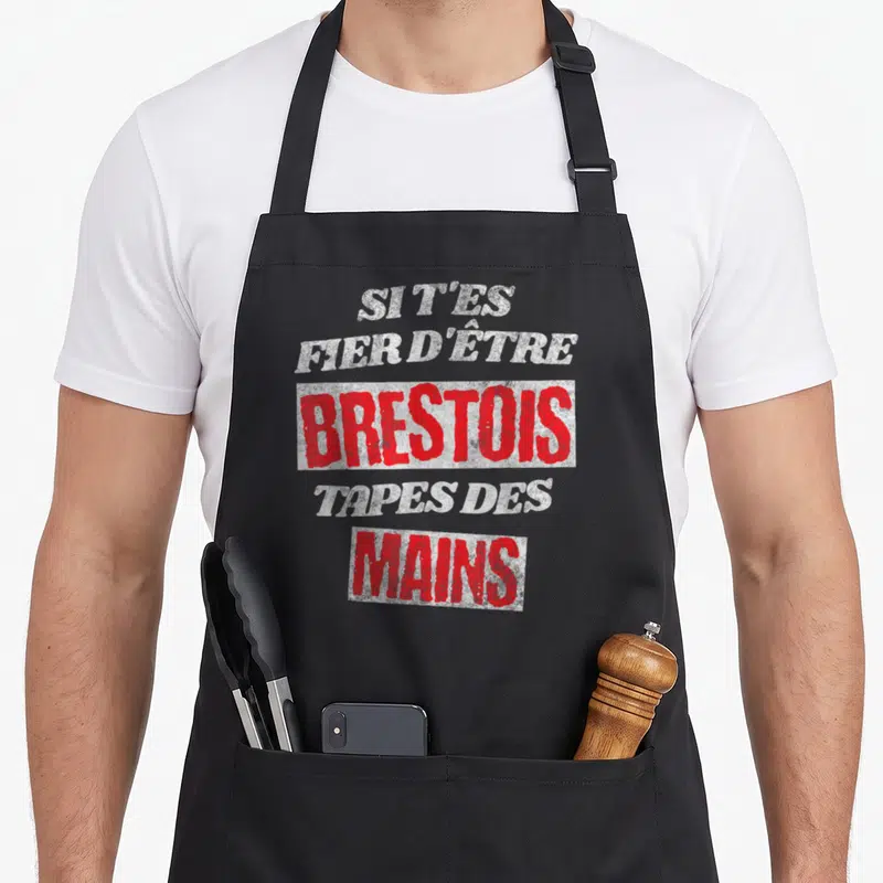 Tablier de cuisine noir avec inscription Si t'es fier d'être Brestois tapes des mains en typographie rouge et blanche.