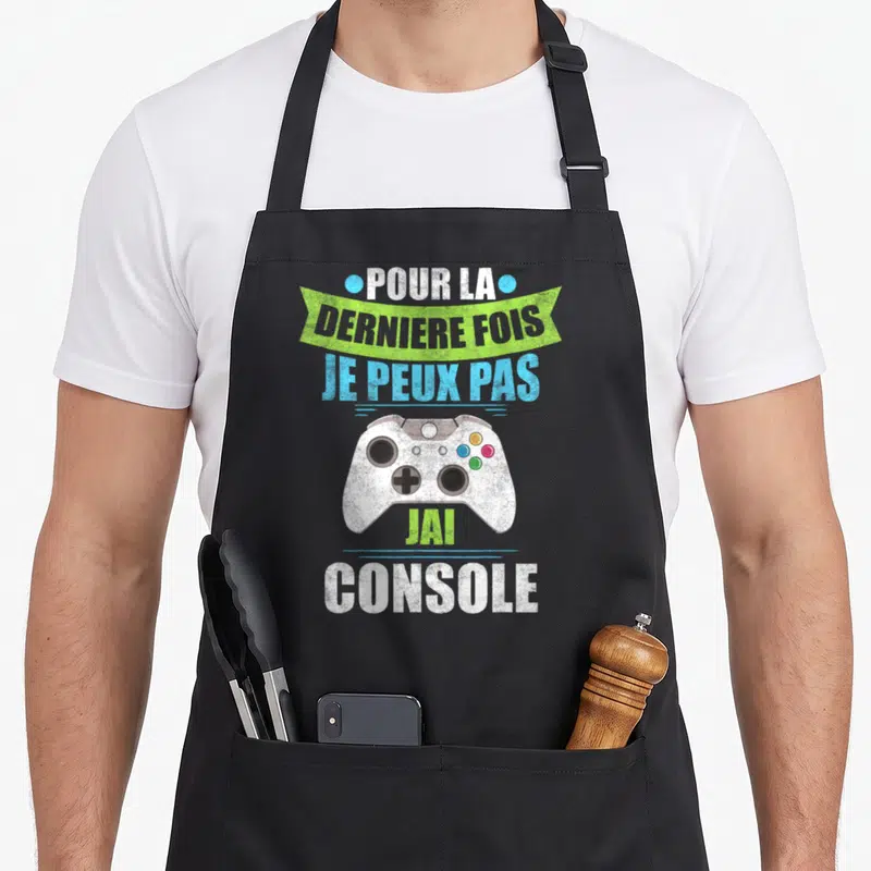 Tablier de cuisine noir avec illustration de manette de jeu vidéo et texte Pour la dernière fois je peux pas j'ai console