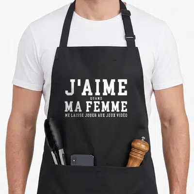 Tablier de cuisine noir avec inscription blanche J'aime quand ma femme me laisse jouer aux jeux vidéo.