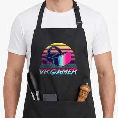 Tablier de cuisine noir avec illustration casque VR et texte VR GAMER style synthwave coloré.