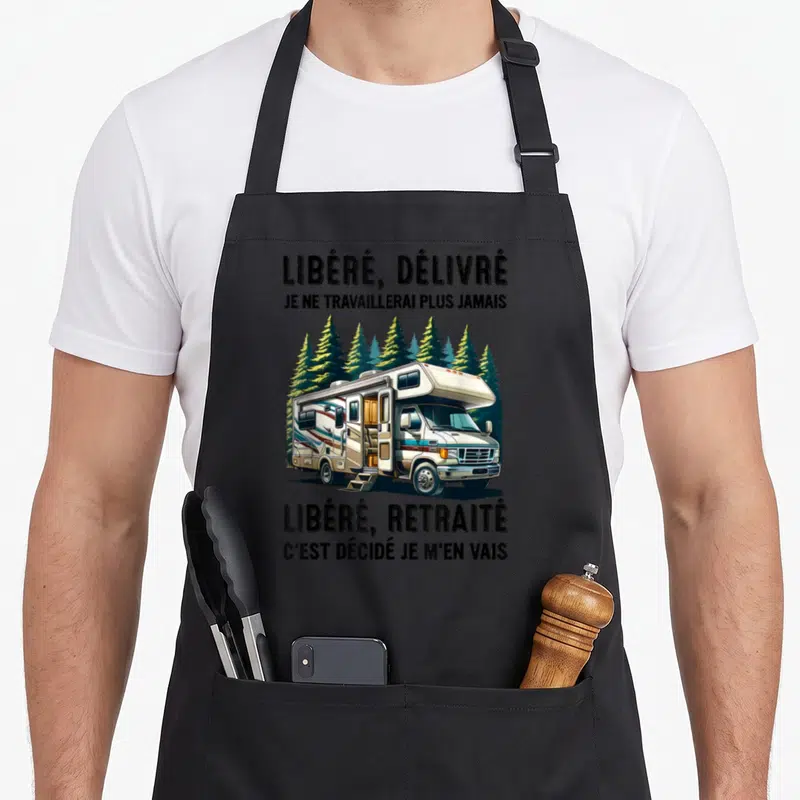 Tablier de cuisine noir avec illustration de camping-car et texte Libéré délivré je ne travaillerai plus jamais.
