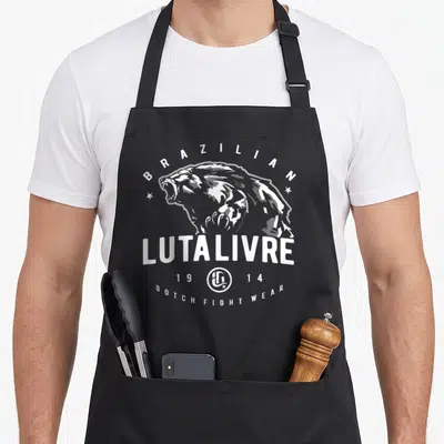 Tablier de cuisine noir avec illustration d'ours et texte Brazilian Luta Livre Gotch Fightwear 1914 en blanc.