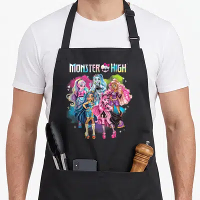 Tablier de cuisine noir avec illustration colorée du groupe Rainbow Cloud et logo Monster High arc-en-ciel.