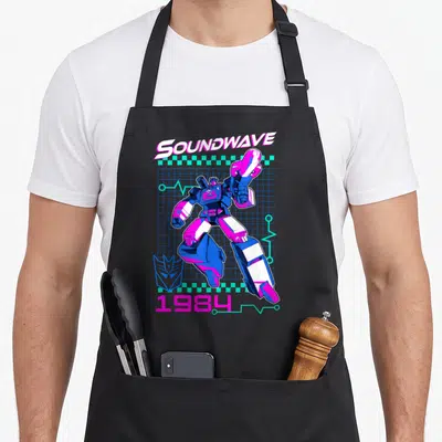 Tablier de cuisine noir avec illustration Soundwave 1984 aux couleurs néon et grille graphique bleue.