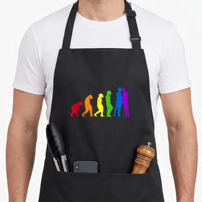 Tablier de cuisine noir avec silhouettes évoluant en couleurs arc-en-ciel jusqu'au baiser final.